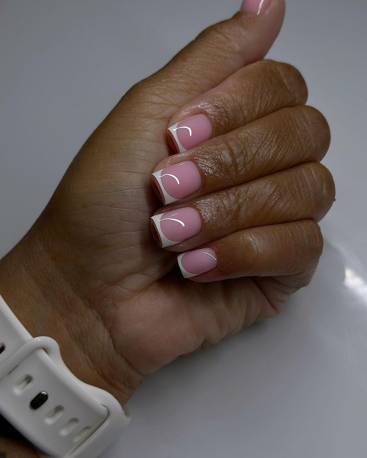 Elegant Soft Pink and White Tip Nails: A Modern Take on Classic French Design.