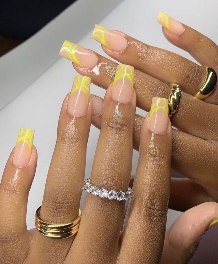 Playful Elegance: Colorful Nude Nail Design with Striking Yellow Lines and Chic Accessories