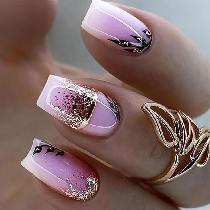 Sophisticated Soft Pink Gradient Nail Design with Glossy White Tips and Elegant Accents.