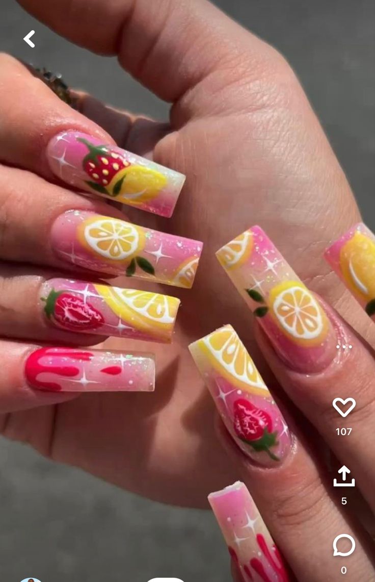 Vibrant Fruit-Inspired Nail Design with Pink and Yellow Gradients.