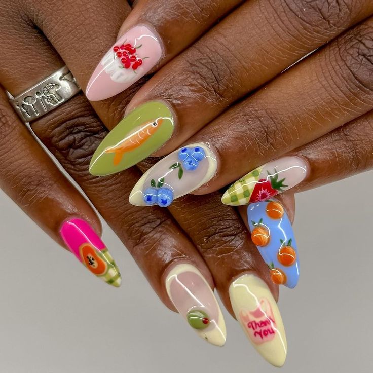 Playful Pastel Nail Art Featuring Whimsical Fruit and Vegetable Motifs.