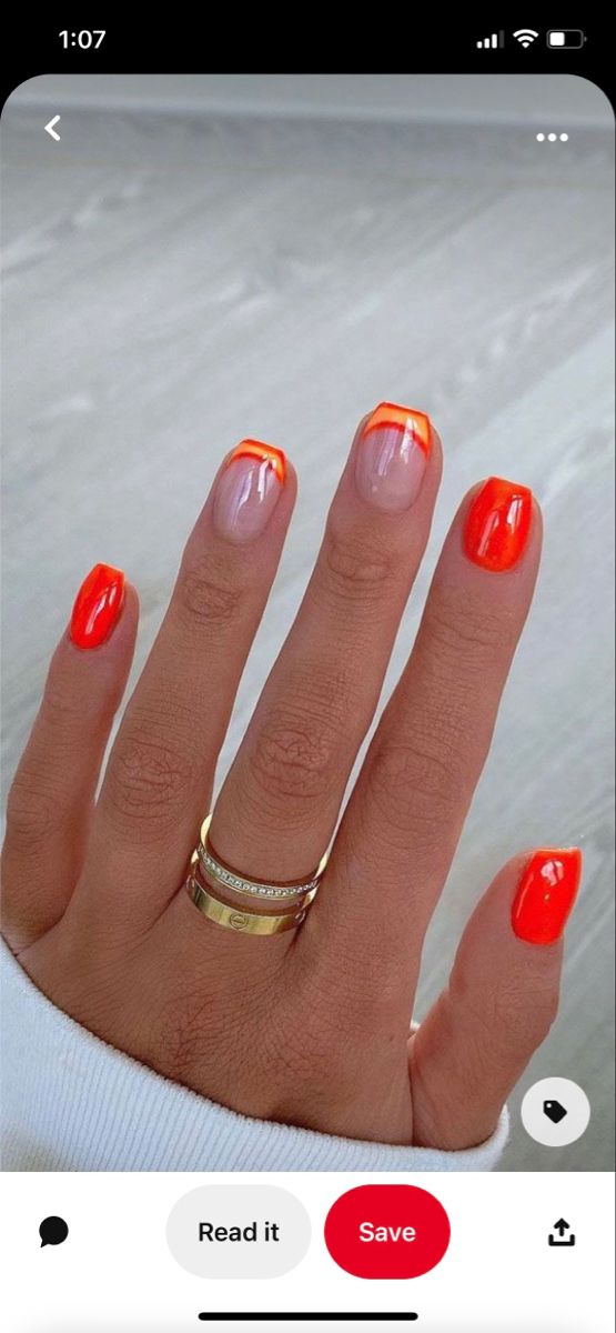 Bold Orange French Tip Nail Design: A Fun and Eye-Catching Statement.