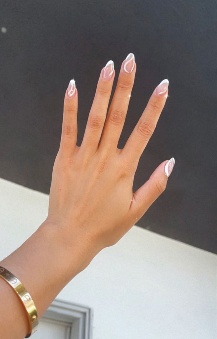 Sophisticated Abstract Nail Design with Soft White Accents