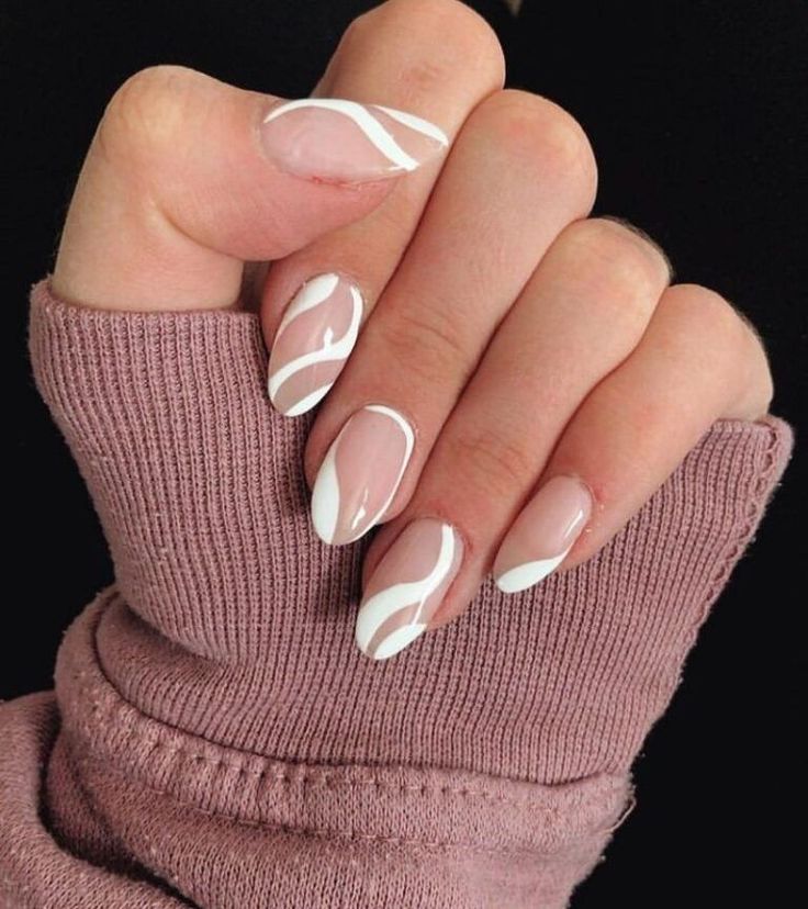 Chic and Sophisticated Soft Nude Nails with Sleek White Swirls.