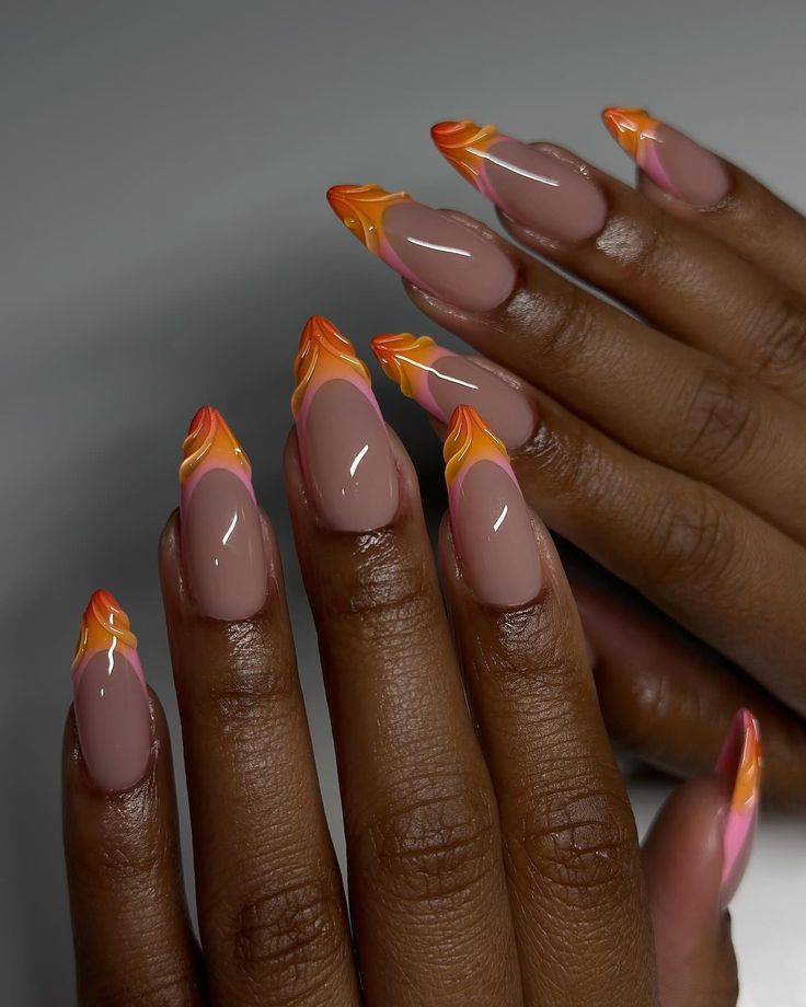 Vibrant Flame-Inspired Nail Design with Almond-Shaped Tips