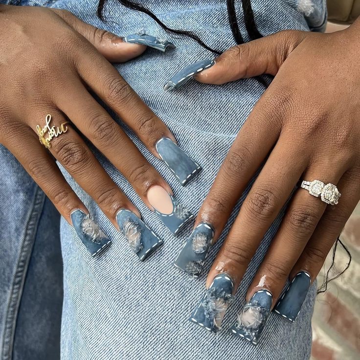 Sophisticated Marbled Blue Long Square Nail Design with Neutral Accent.