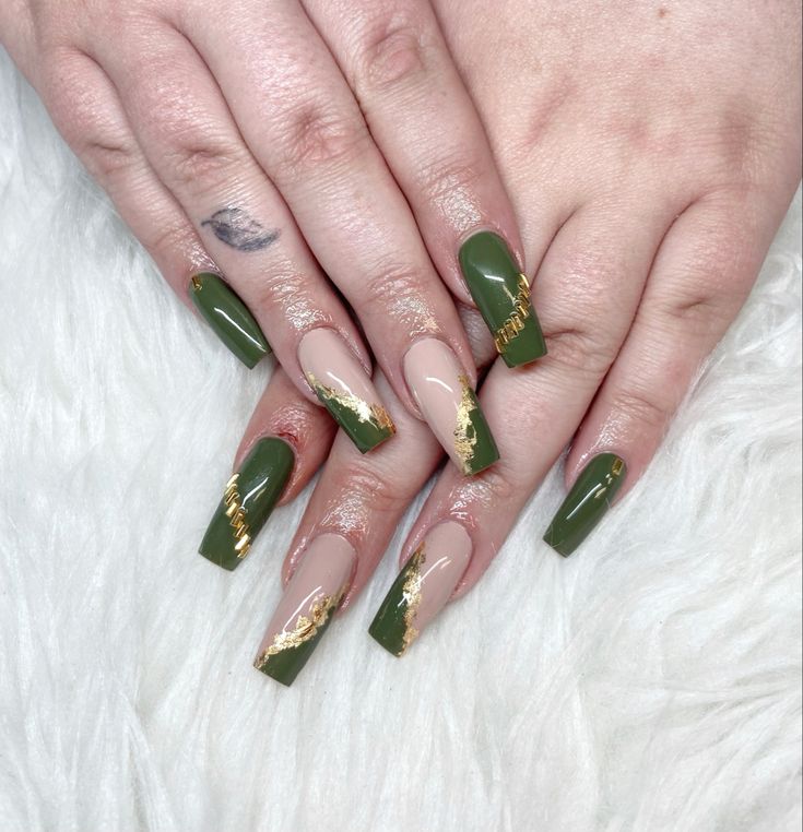 Striking Bold Nail Design: Deep Green and Beige Contrast with Sophisticated Gold Details