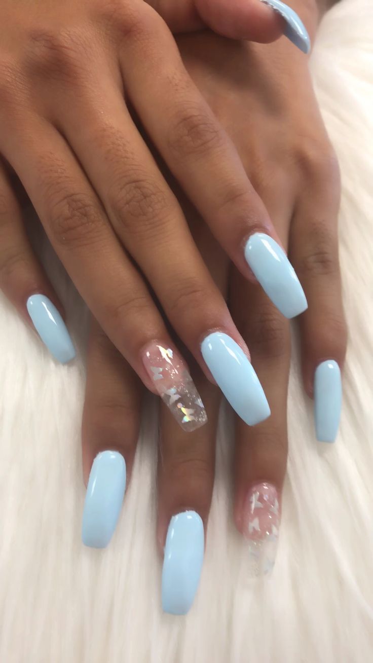 Elegant Light Blue Manicure with Shimmering Accent Nail