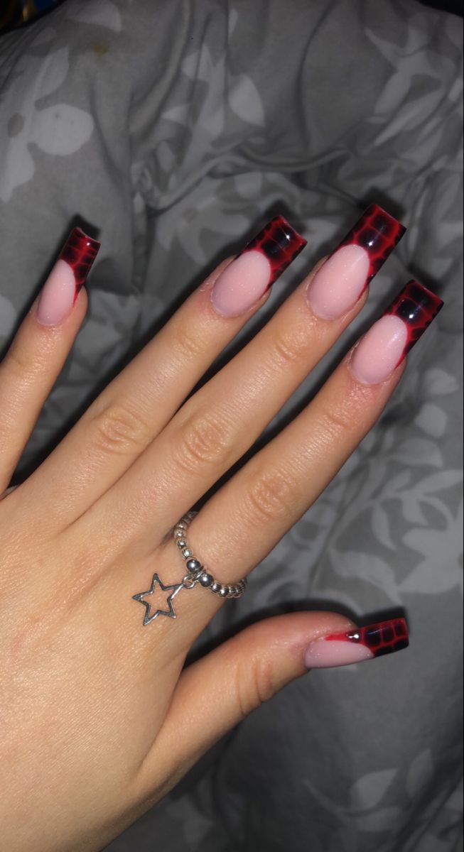 Chic Red-Tipped Nails: A Bold Fusion of Glamour and Modern Sophistication.