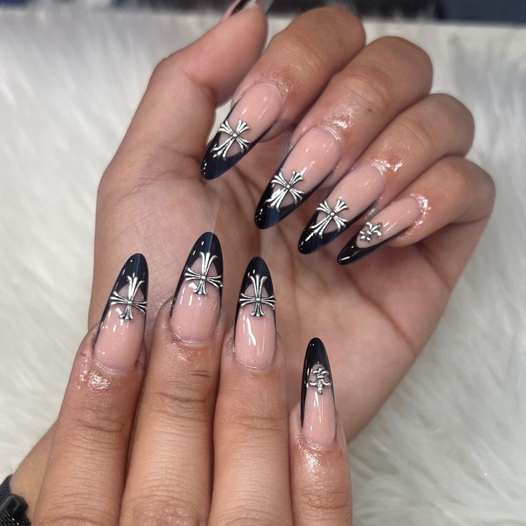 Chic Pointed Nail Design with Nude and Navy Shades and Silver Embellishments.