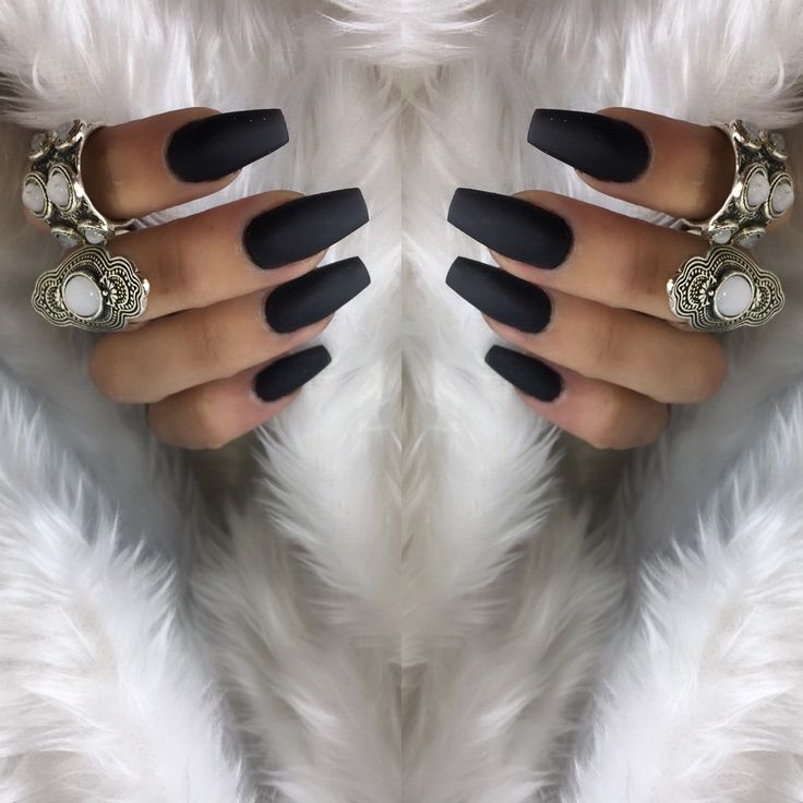 Chic Black Matte Nails with Intricate Silver Rings: A Bold Statement in Sophistication