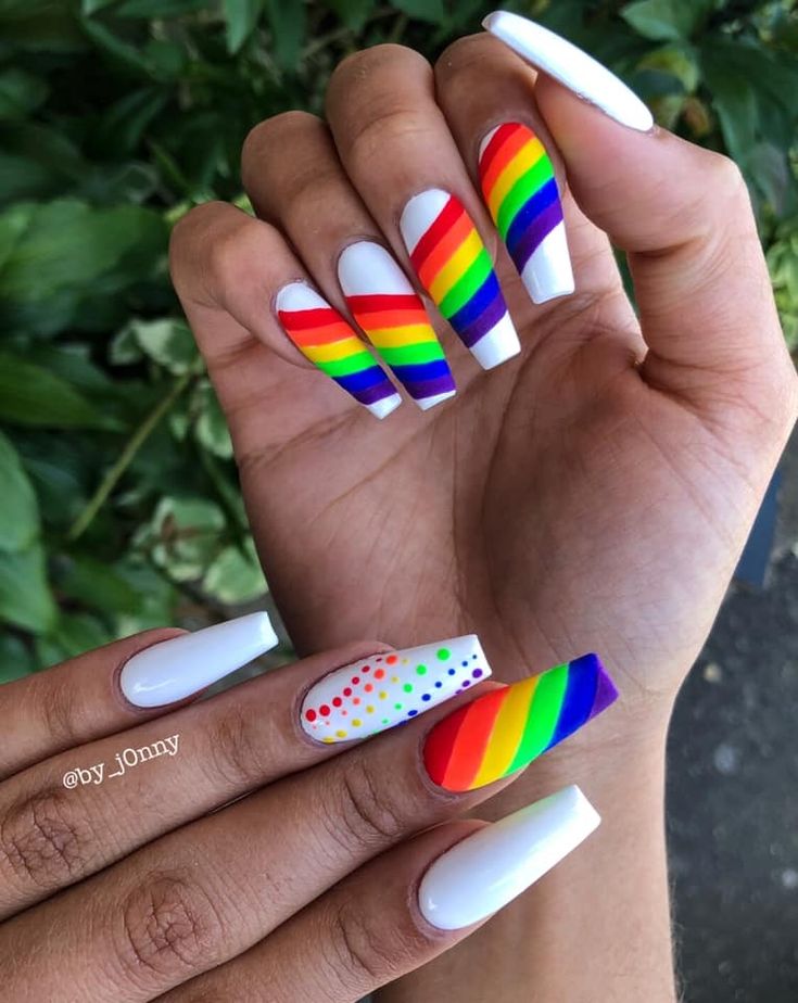 Vibrant Rainbow-Themed Nail Design with Classic White Accents