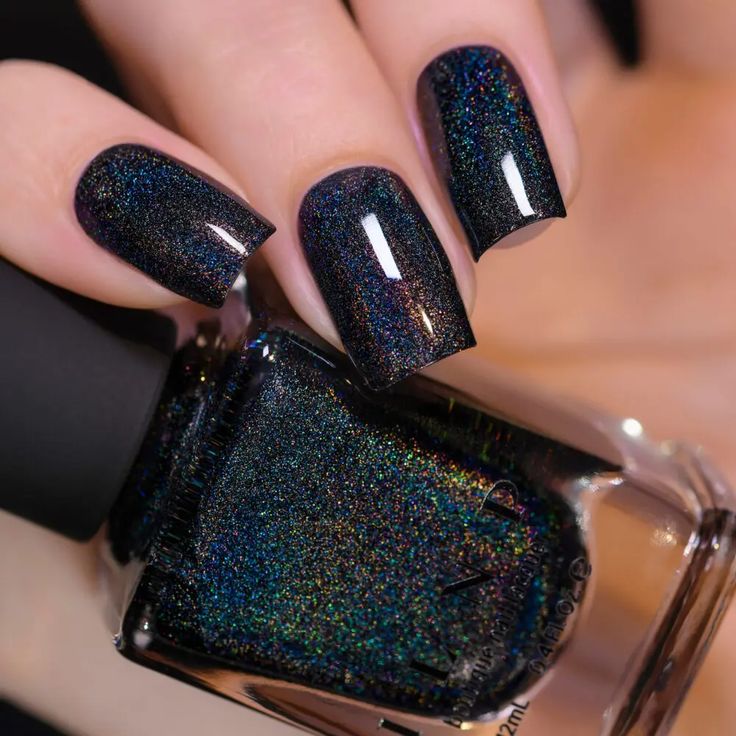 Captivating Holographic Nail Design in Deep Black and Blue with Shimmering Color Shifts and Sleek Square Shapes