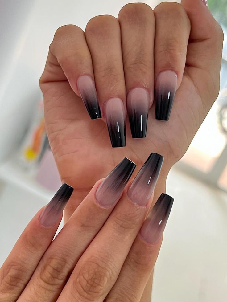 Ombre Nail Design: Soft Pink to Bold Black Tips on Elongated Square Nails for Dramatic Effect.