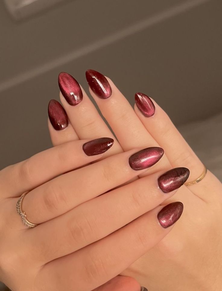 Chic Gradient Almond-Shaped Nails in Deep Burgundy and Metallic Shine.