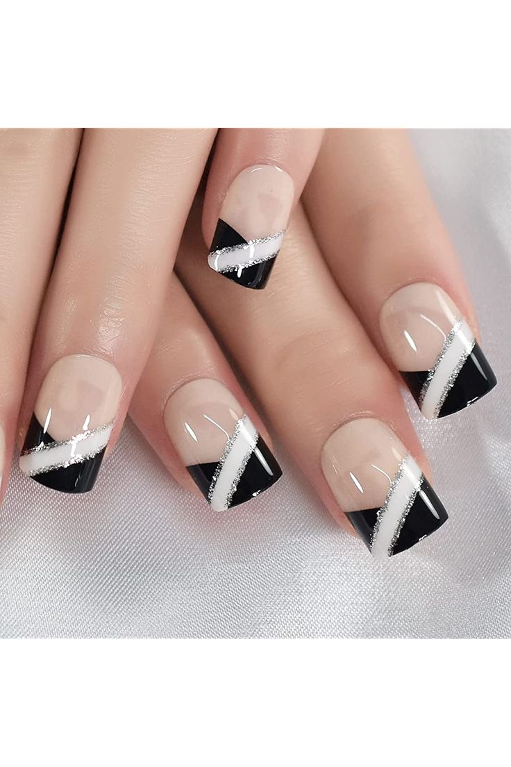 Elegant Edgy Chic: Modern Geometric Nail Design in Nude, Black, and White.