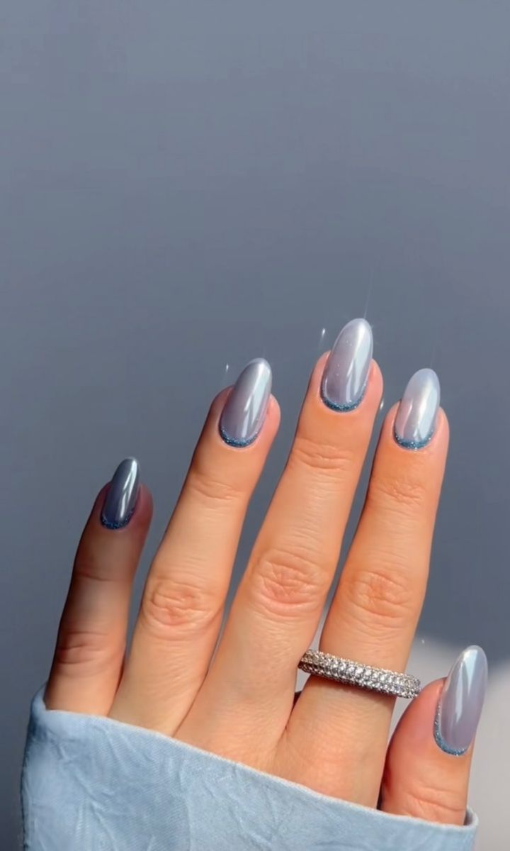 Sleek Silver Ombre Nails: Elegant Glossy Design with Subtle Depth.