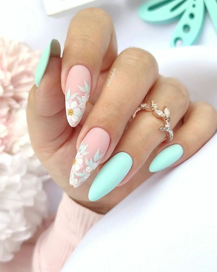 Playful Pastel Nail Design with Floral Accents for Spring and Summer.