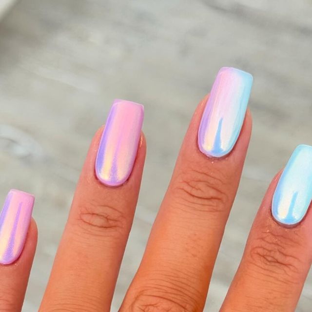 Stunning Ombre Nail Design in Dreamy Pastel Pink and Blue with Iridescent Glamour.