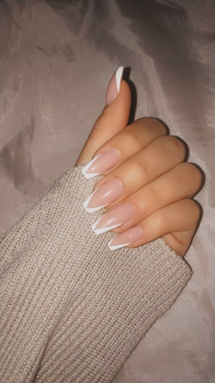 Sophisticated Almond-Shaped Nail Design: Soft Pink Base with Classic White Tips