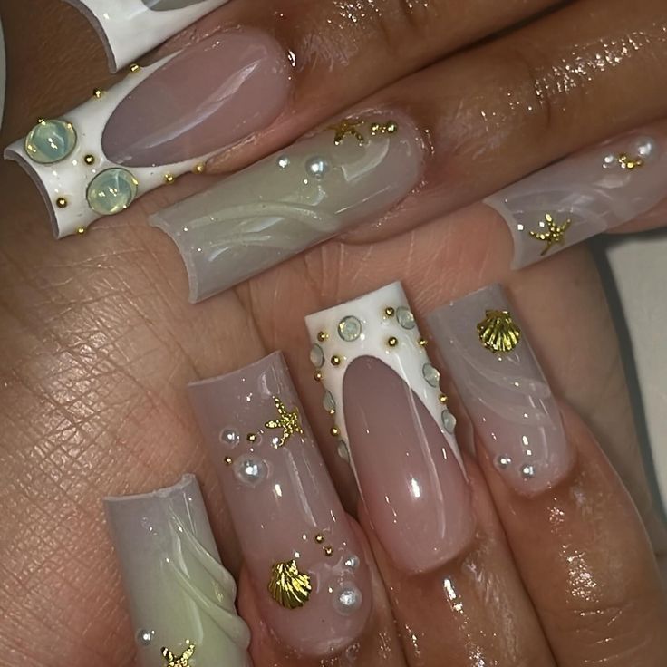 Whimsical Ocean-Inspired Nail Design with Pastel Colors and Elegant Gold Accents