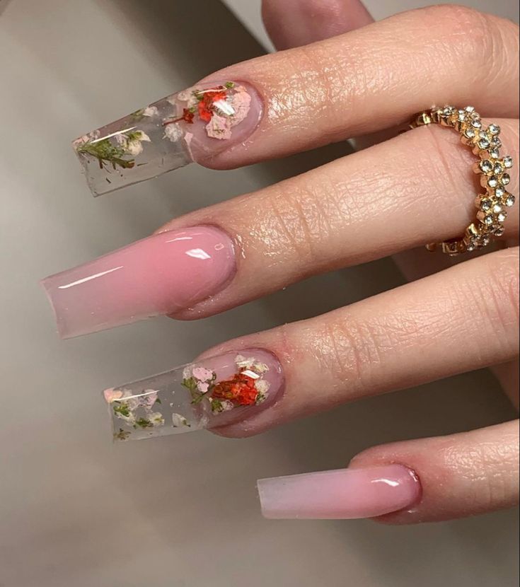 Elegant Floral Nail Design with Gradient Acrylics and Dried Flowers.