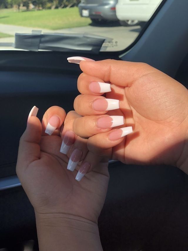 Elegant Long Nails with Classic French Tip Design for Any Occasion