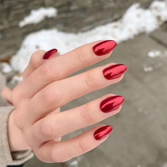 Elegant Almond-Shaped Glossy Red Nails: A Striking Statement for Any Occasion.