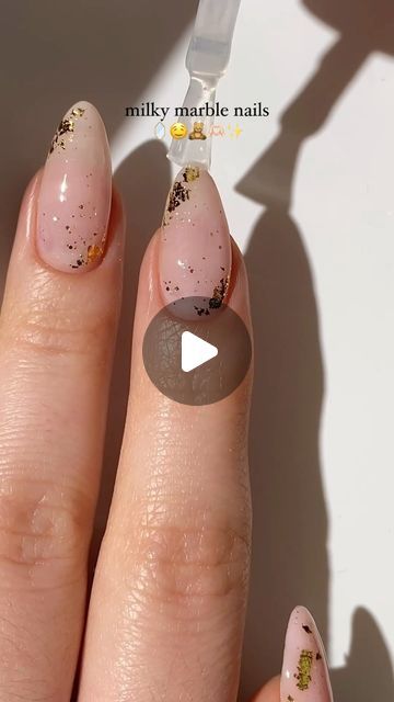 Elegant Milky Marble Nails with Nude Gradient and Gold Flakes