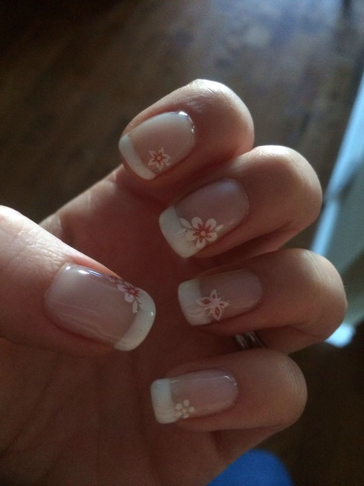 Elegant Floral Accents on Classic French Manicure for a Delicate Spring/Summer Look.