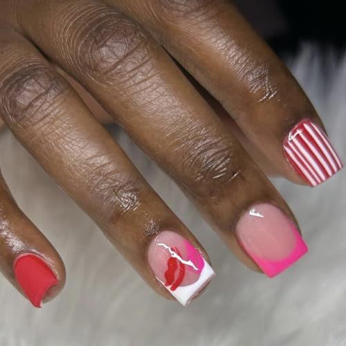 Vibrant Nail Art Design with Flirty Graphics and Playful Patterns.