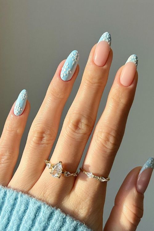 Chic Elegant Nail Design: Soft Pink and Pastel Blue with 3D Textures and Dotted Patterns.