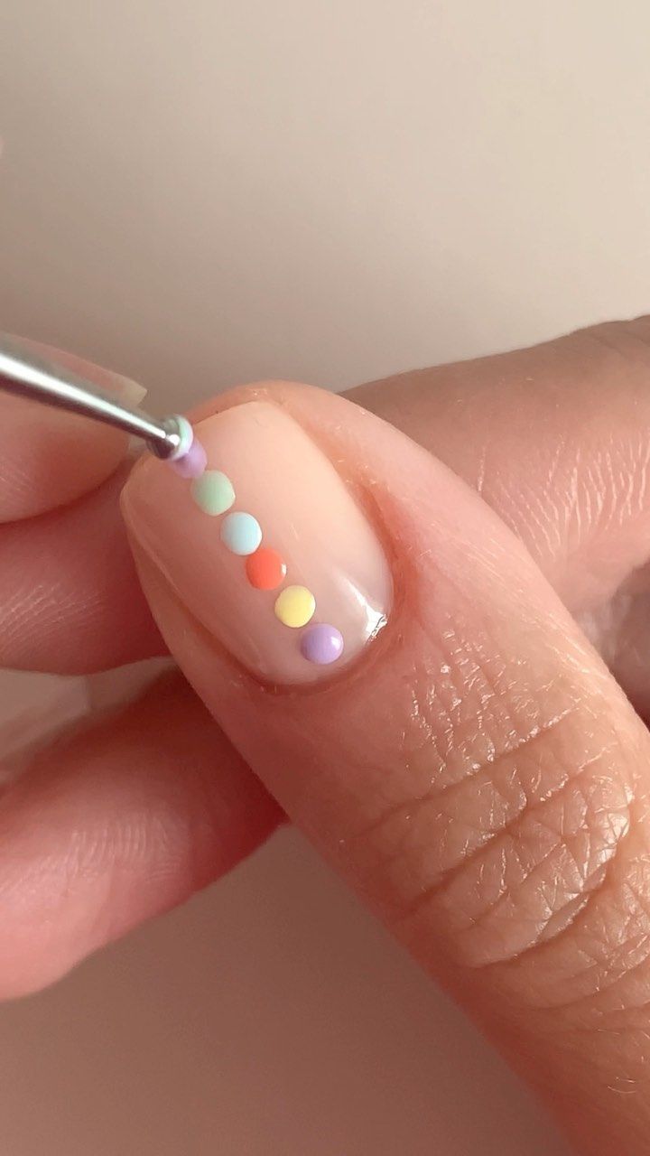 Playful Elegance: A Colorful Pastel Dot Nail Design