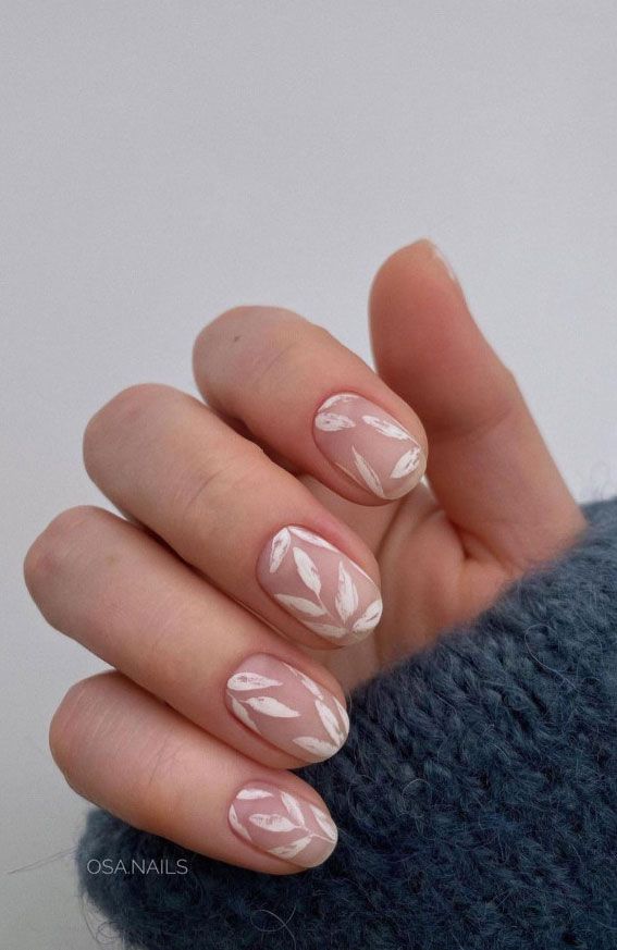 Elegant Leaf-Inspired Nail Design in Soft Neutral Shades