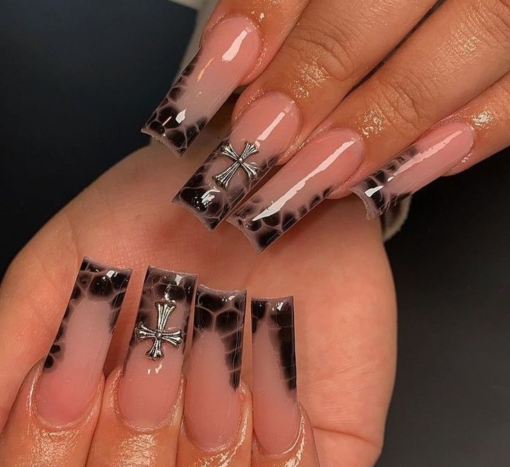 Sophisticated Long Squared Nail Design with Black Gradient Tips and Metallic Cross Accents.