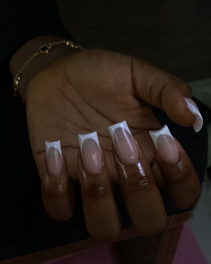 Chic Half-Moon Nude and White Nail Design with Glossy Finish