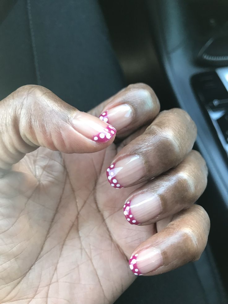 Charming Playful Pink French Tip Nail Design with White Polka Dots