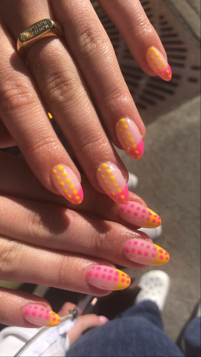 Playful Pink and Yellow Gradient Nail Design with Polka Dots for a Fun Summer Vibe.