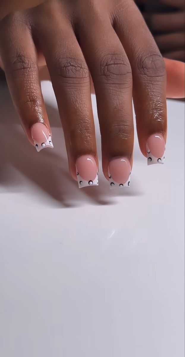 Elegant Pink and White Nail Design with Whimsical Minimalist Patterns