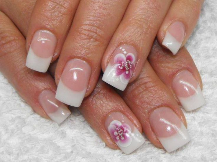 Sophisticated French Tip Nails with Floral Accents for Versatile Elegance.