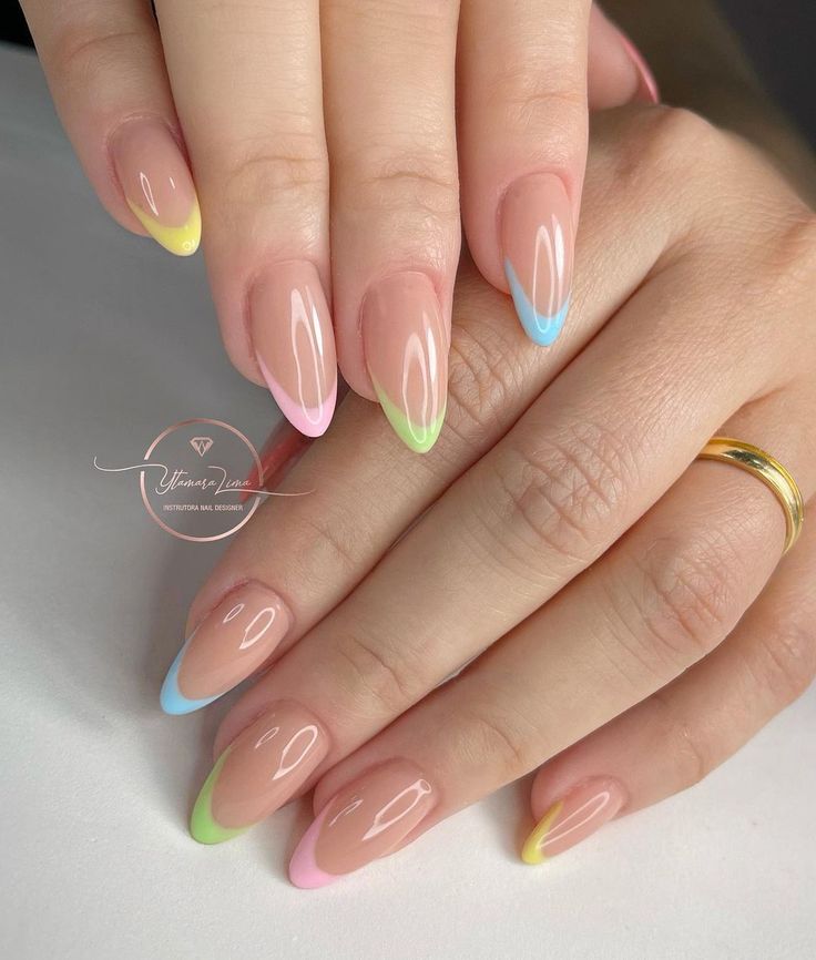 Playful Elegance: Colorful French Tips with Pastel Shades.