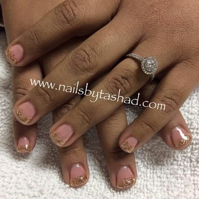 Chic Nude Nail Design with Sparkling Gold Tips for Any Occasion