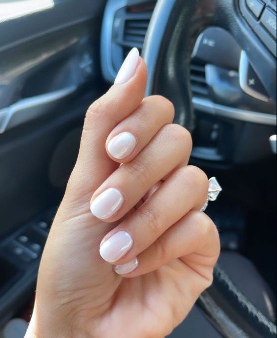 Chic Minimalist Nail Design with Soft Milky White Polish for Versatile Elegance