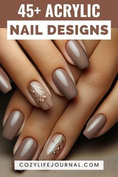 Sophisticated Acrylic Nail Designs in Brown and Taupe with Nature-Inspired Accents.