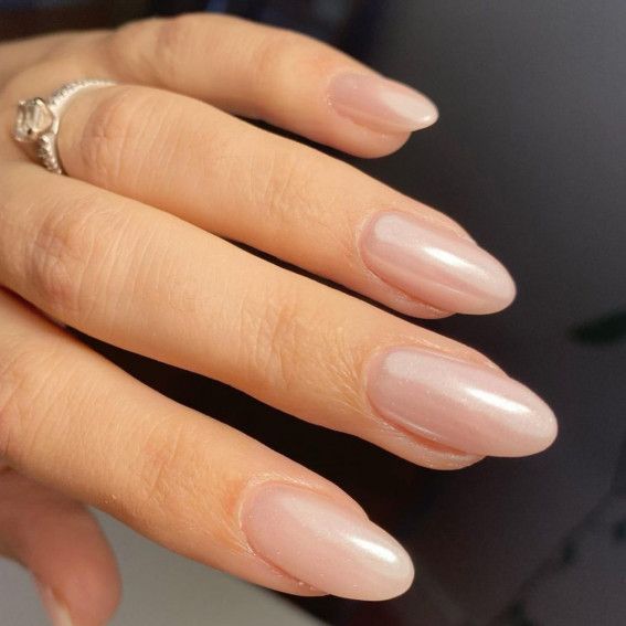 Chic Elegant Nude Almond Gel Nails with Shimmer Finish