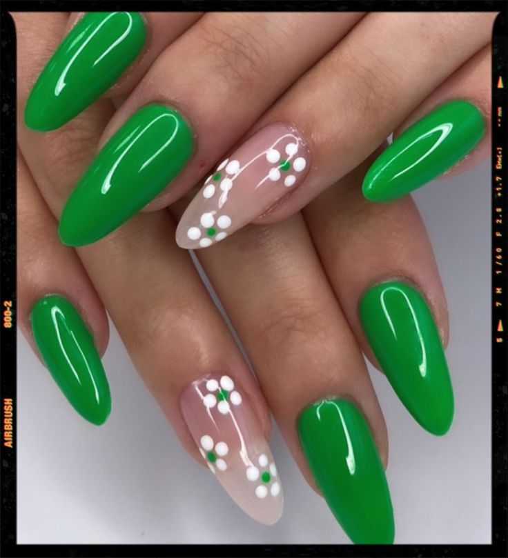 Vibrant Bold Green Nail Design with Elegant Floral Accent Nail