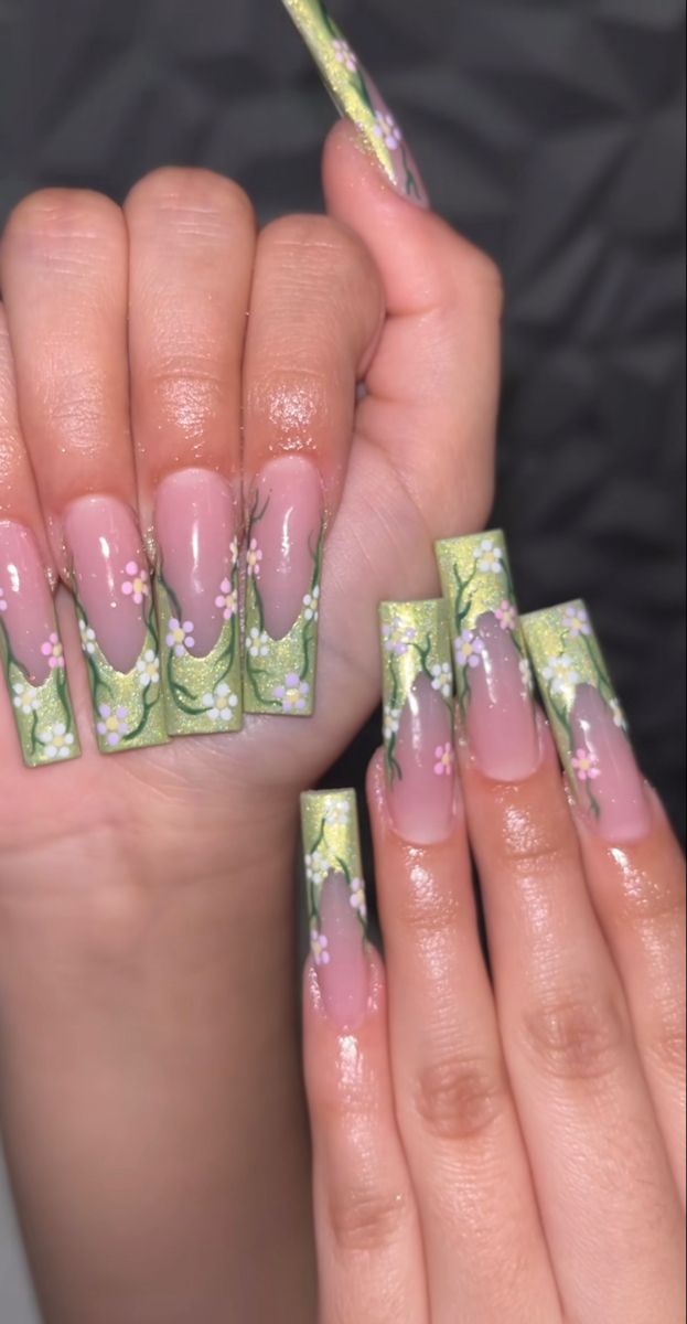 Elegant Floral Stiletto Nail Design: Soft Pink with Vibrant Green Tips