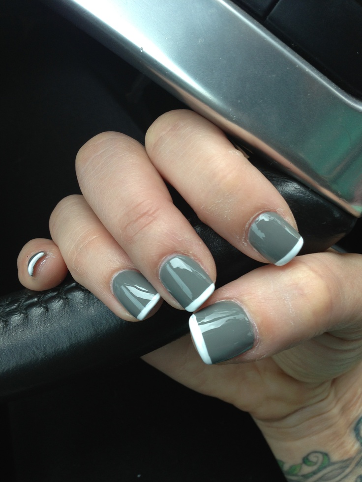 Chic French Tip Gray Manicure: A Blend of Sophistication and Playfulness.