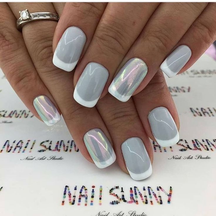 Sophisticated Soft Gray French Tip Nails with Iridescent Glamour.