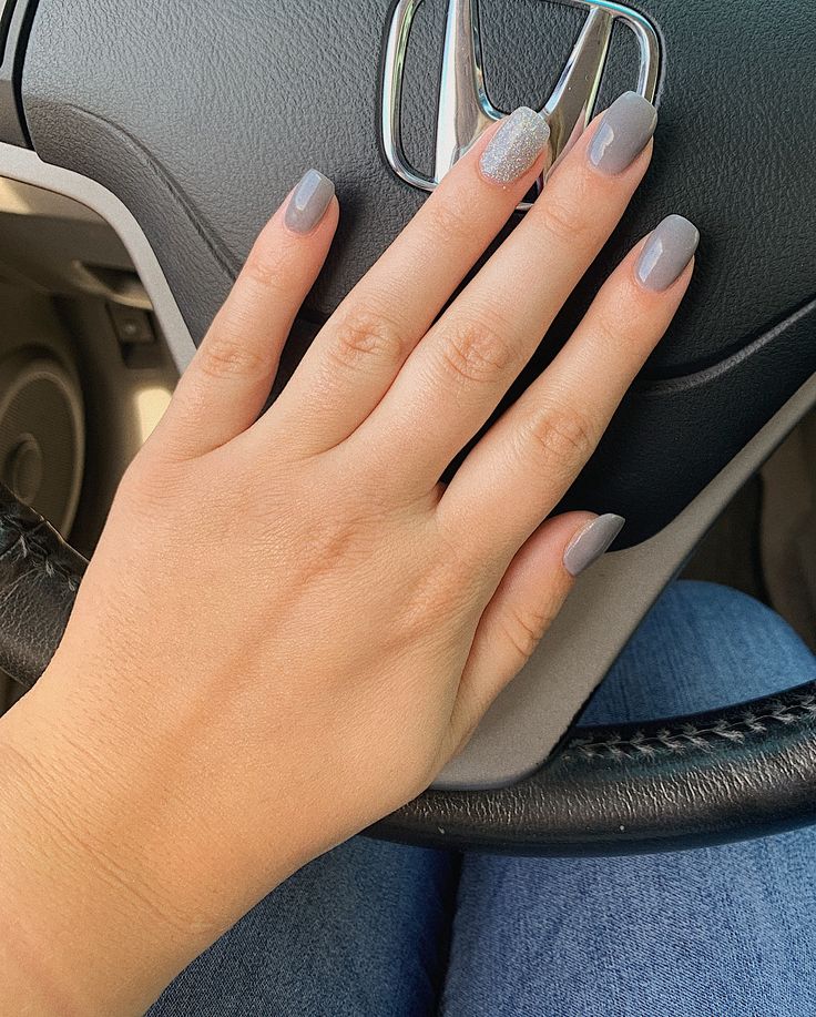 Chic Grey Manicure with Shimmering Accent for Everyday Elegance.